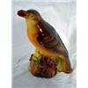 Image 1 : CHALKWARE PERCHED BIRD EATING CRANBERRIES CIRCA 1932. 5"X4"