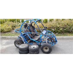 BLUE OFF ROAD SIDE BY SIDE WITH ROLL CAGE AND BRAND NEW BATTERY, RUNS, NEEDS CARB CLEANED, WITH EXTR