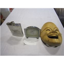 CLOCK, FLASK, AND WOODEN MASK