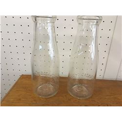 PINT SIZED MILK BOTTLES (LOT OF 2 SASKATCHEWAN CREAMERIES EMBOSSED)