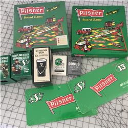 LOT OF PILSNER, ROUGHRIDERS, WISERS LICENCE PLATE, BOARD GAME ETC.