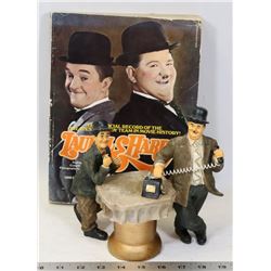 LAUREL AND HARDY WITH BOOK