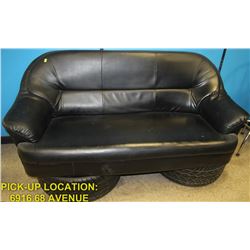 "MAN CAVE" LEATHERETTE LOVESEAT WITH TIRE & RIM