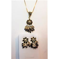 19)  GOLD TONE WITH BLACK & CLEAR CRYSTAL