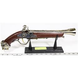 DECORATIVE MUSKET WITH STAND.