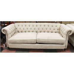 BEIGE 90" FABRIC STUDDED SOFA