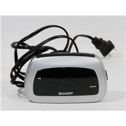 SHARP CLOCK WITH BATTERY BACK UP
