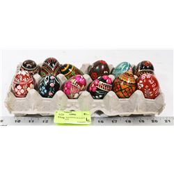 A DOZEN UKRAINIAN WOODEN EASTER EGGS.