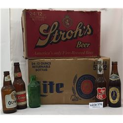 TWO CASES OF EMPTY BEER BOTTLES