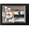 Image 1 : 2011 PANINI #9 ERIK GUDBRANSON PLAYER WORN MATERIAL & AUTOGRAPH HOCKEY CARD (10/99)