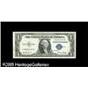 Image 1 : Fr. 1614 $1 1935E* Silver Certificate. About Uncircul