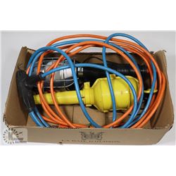 BOX WITH WORK LIGHTS AND EXTENSION CORD.