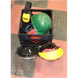 CRATE WITH FACE SHIELDS AND HARD HATS.