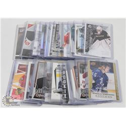 LOT OF 26 ROOKIE HOCKEY CARDS - ASST SETS & YEARS.