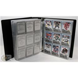 BINDER OF OVER 750 OPEECHEE HOCKEY CARDS 2011-12.