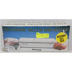 DECOSONIC VACUUM BAG SEALER.