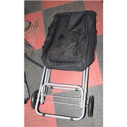WHEELED SHOPPING BAG WITH FOLDING SEAT.