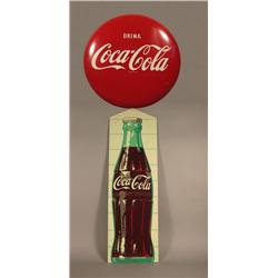 Two Coca-Cola Signs