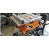 Image 4 : RIGID TABLE SAW WITH FENCE AND FOLDING ROLLING STAND