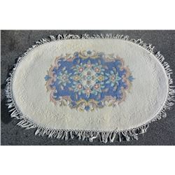 OVAL FRINGED AREA CARPET