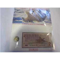 CANADIAN $2 UNCIRCULATED COIN, BANK NOTES, STAMP SET IN CANADA POST FOLDER