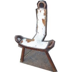 unique cowhide covered 3 leg chair