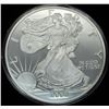 Image 1 : 12 OZT .999 PURE SILVER ROUND IN CAPSULE