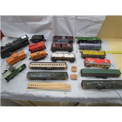 LOT OF 17 TOY TRAIN CARS ( ENGINES, CABOOSE, ETC…)