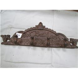 CAST IRON TOWEL RACK ( HOT BATH-25 CENTS, SOAP AND TOWEL-10 CENTS EXTRA)