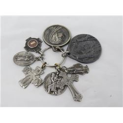 LOT OF 7 RELIGIOUS PENDANTS