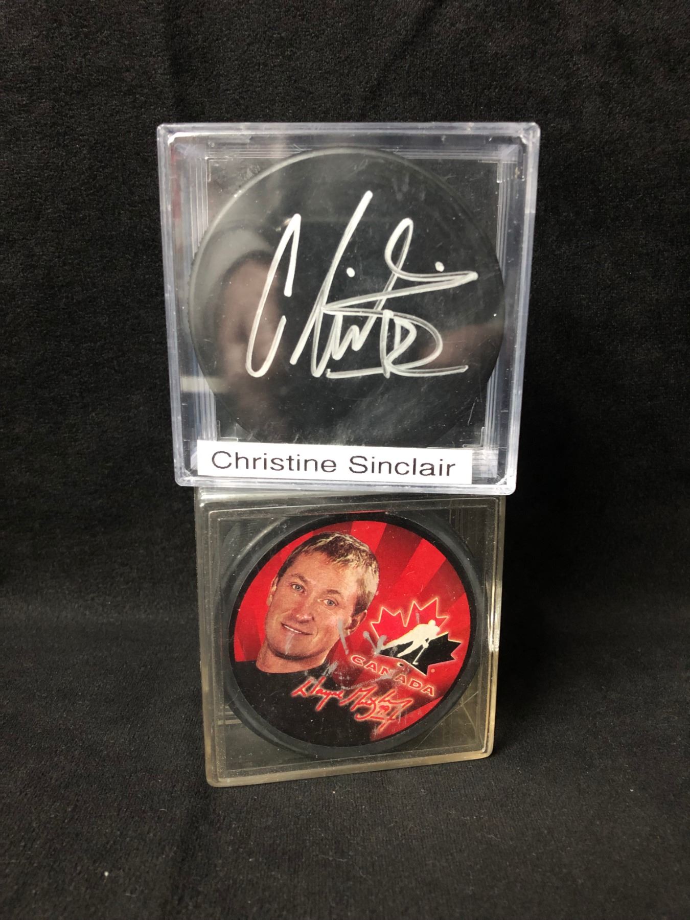 CHRISTINE SINCLAIR SIGNED HOCKEY PUCK W/ GRETZKY SOUVENIR PUCK