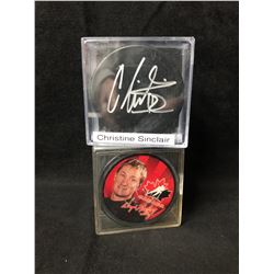 CHRISTINE SINCLAIR SIGNED HOCKEY PUCK W/ GRETZKY SOUVENIR PUCK