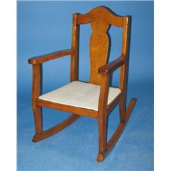 CHILD’S OAK ROCKING CHAIR