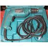 Image 1 : MAKITA 3/8" POWER DRILL
