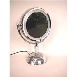 AN ART DECO STYLE LIGHTED COSMETIC MIRROR