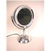 Image 1 : AN ART DECO STYLE LIGHTED COSMETIC MIRROR