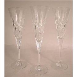 A SET OF TEN CRYSTAL CHAMPAGNE FLUTES