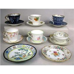 A MISCELLANEOUS GROUP OF TEA CUPS AND SAUCERS