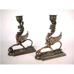 A PAIR OF CAST BRASS CANDLESTICKS, GERMAN