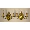 A PAIR OF BRASS PATINATED METAL TWO-LIGHT WALL SC