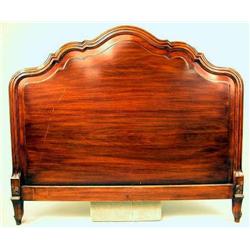 A LOUIS XV STYLE WALNUT BEDSTEAD