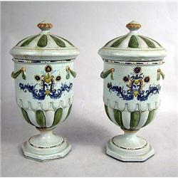 A PAIR OF ITALIAN POTTERY COVERED URNS