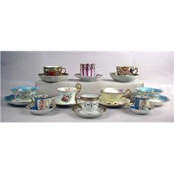 A GROUP OF ASSORTED CUPS AND SAUCERS