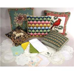 A GROUP OF ASSORTED NEEDLEWORK PILLOWS AND TABLE 