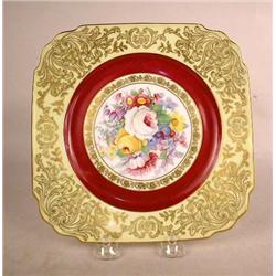 A SET OF TWELVE CREAM-GILT AND MAROON FLORAL DECO