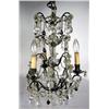 Image 1 : A LOUIS XV STYLE BRONZE AND CRYSTAL CHANDELIER