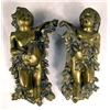 Image 1 : A PAIR OF PATINATED METAL PUTTI FORM HANGING WALL
