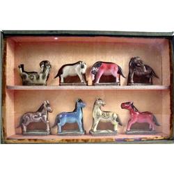 A GROUP OF EIGHT CHINESE FIGURES OF HORSES