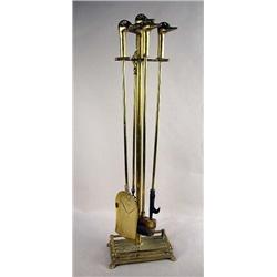 A CAST BRASS WROUGHT IRON DUCK HEAD FIREPLACE STA