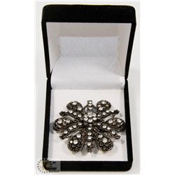 ESTATE ORNATE RHINESTONE BROACH.